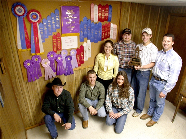 Kneeling from left to right: Andrew Moseley, Slocum, Texas Zach Tappan, Crossroads, Texas Jennifer Basham, Canton, Texas Standing from left to right: Natalie Routt, Malakoff, Texas  Beau Stutts, Captain, Athens, Texas Clayton Lemons, Brownsboro, Texas Marc Robinson, Sponsor Not pictured are: Blake Cammack, Longview, Texas  Casey Herrington, Brownsboro, Texas Zach Hageman, Athens, Texas.  All ribbons and trophies in photo were won during 2002-2003 school year.