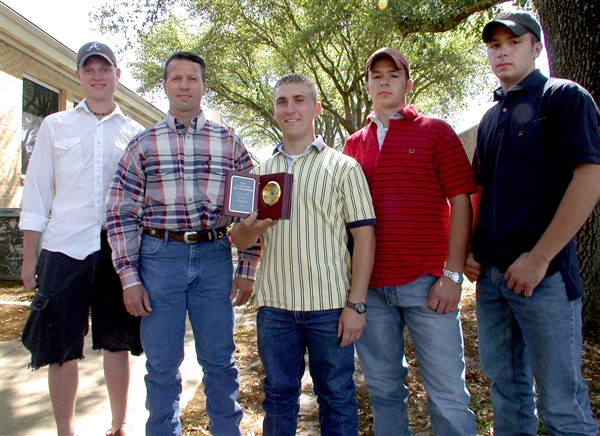 Zach Tappan holding his 1st place Agronomy Quiz Award won at the Texas Junior College Agriculture Association Convention held at Texas State University, San Marcos, Texas