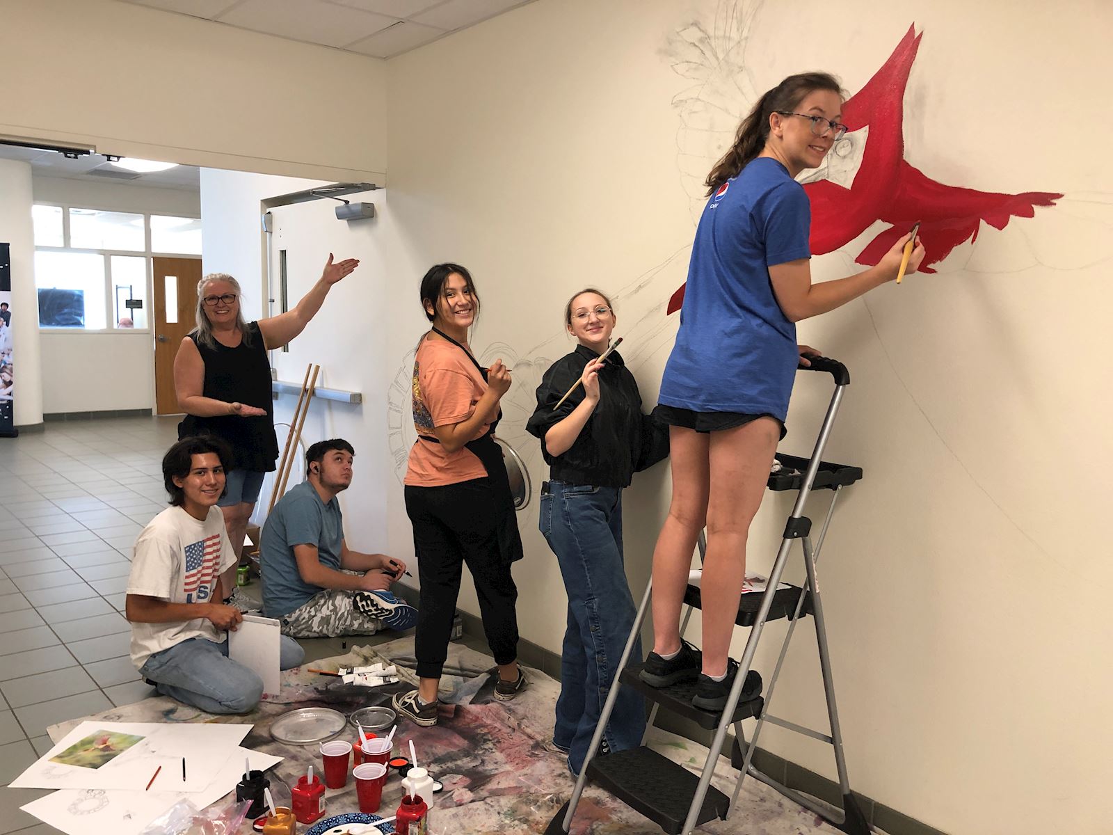 Students working on Trinity Valley mural