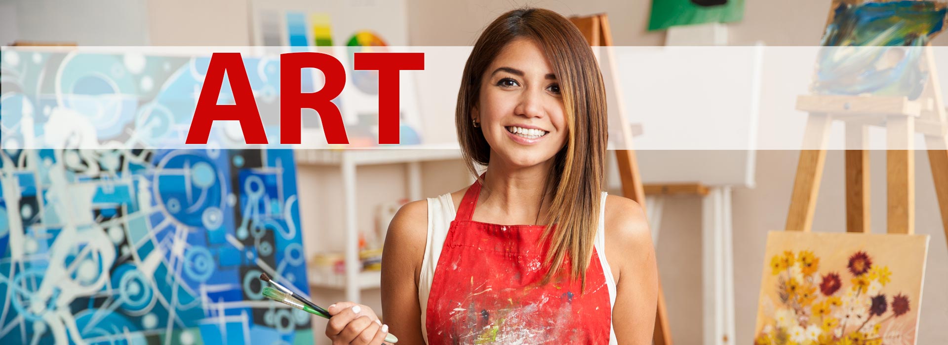 Art - Portrait of a gorgeous female artist working on several art projects on her studio