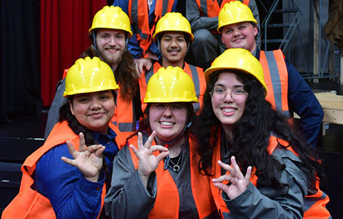 cast members smiling