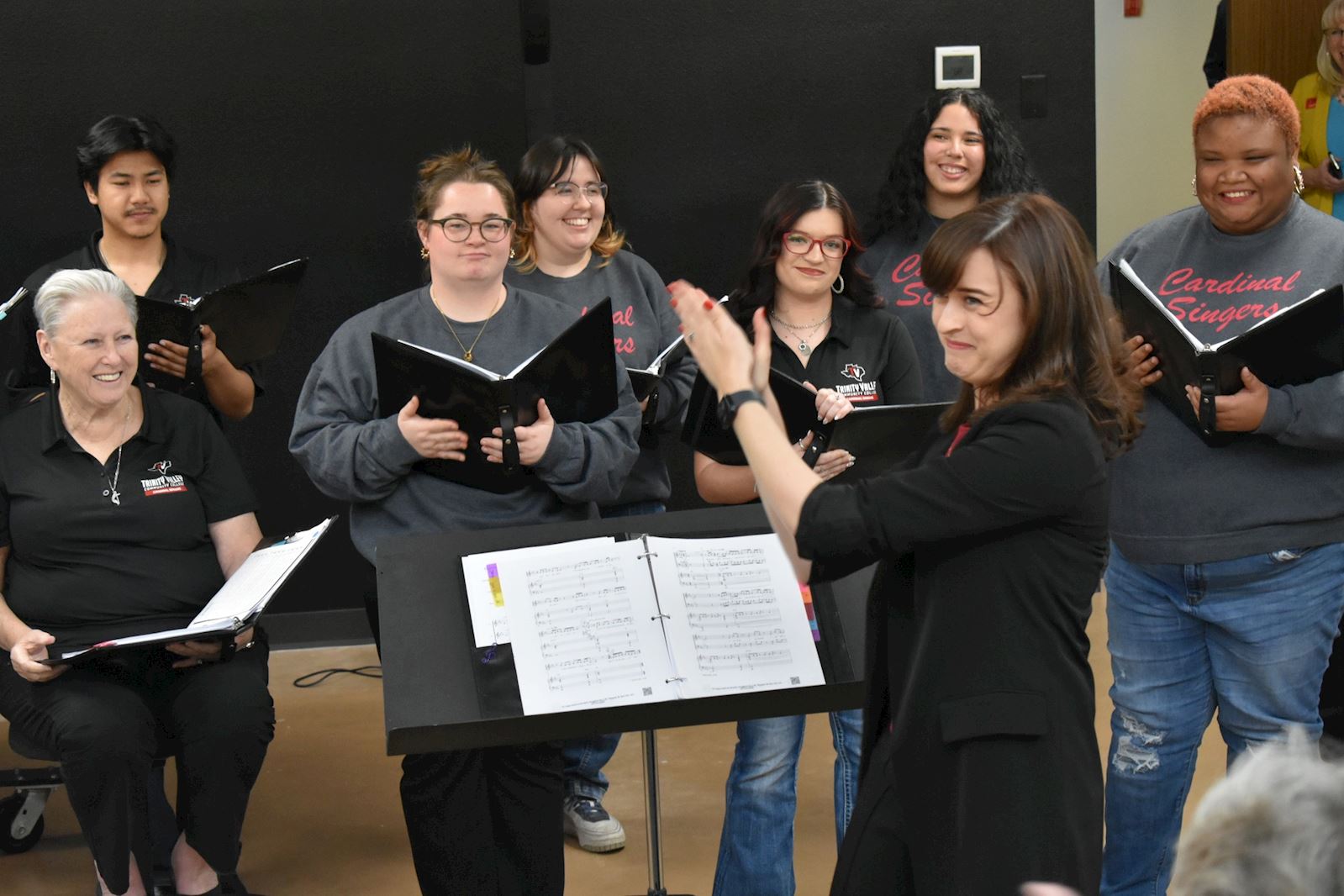 Sarah Simon performs alongside the Cardinal Singers.                                                                                        