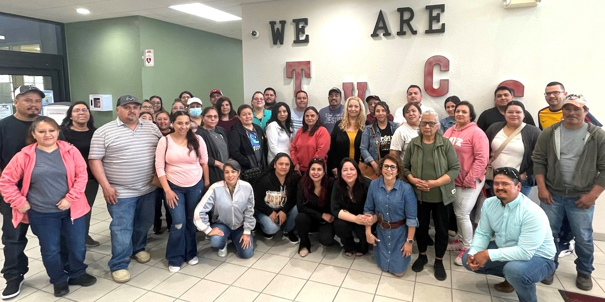 Attendees, advisors and TVCC staff pose after learning about the path to naturalization and citizenship at TVCC’s first Citizenship Class held on the Terrell Campus.