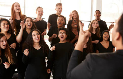 young adults singing in a choir