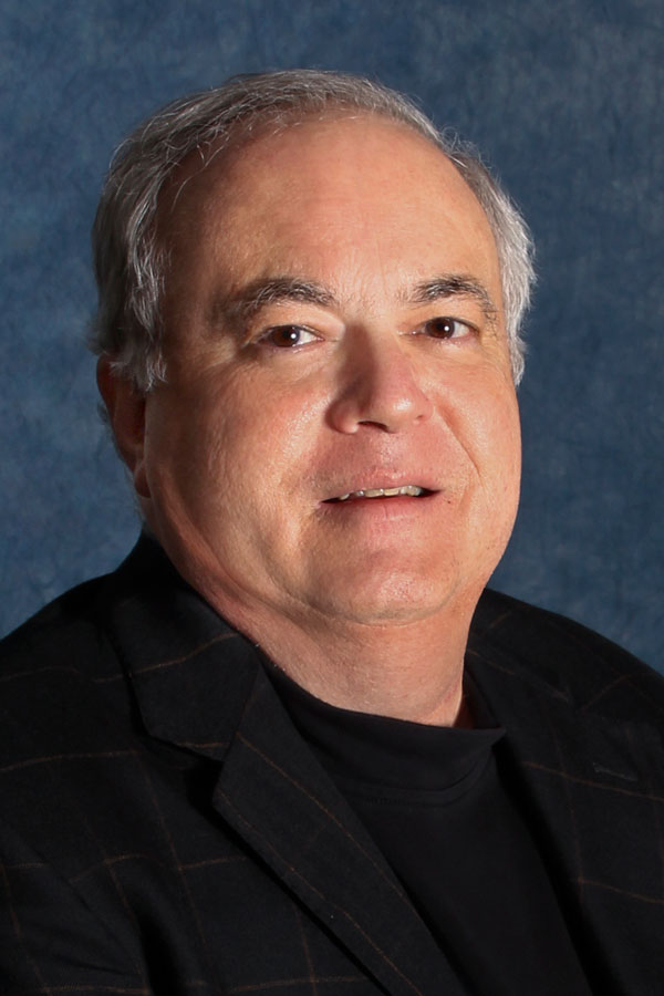 Headshot Charlie Risinger