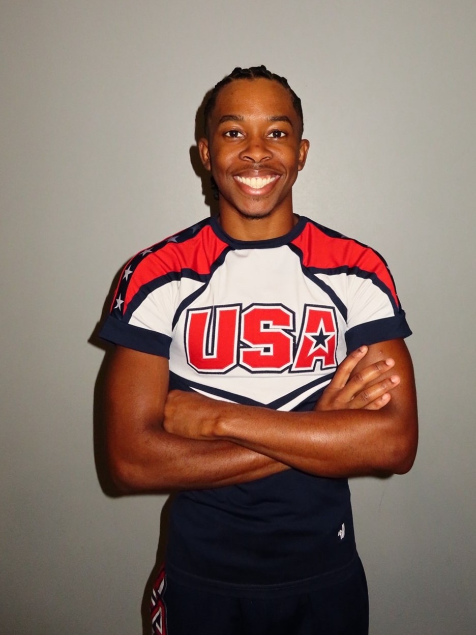 Asa Ware posing in Team USA cheer uniform. 