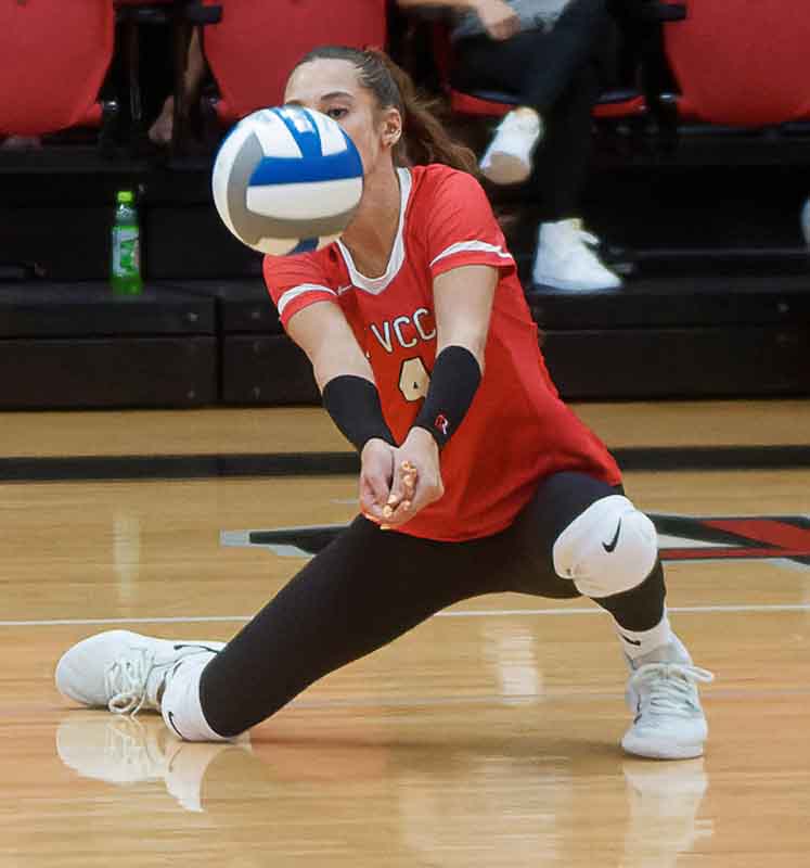 TVCC volleyball athlete volleying the ball
