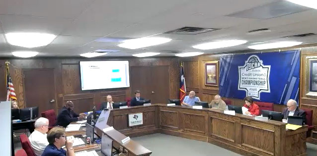 trinity valley community college board of trustees member holding a meeting