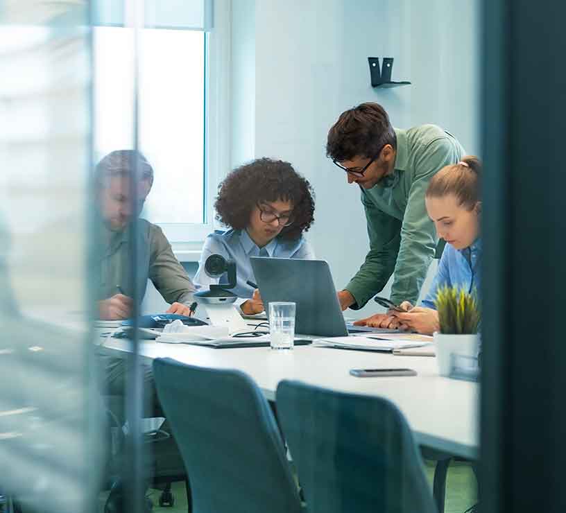 group of people at business meeting in office room