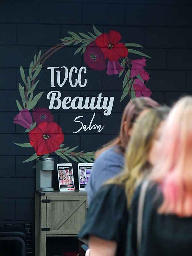 TVCC beauty salon sign on wall