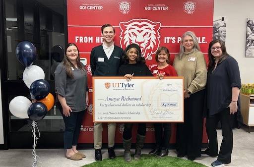 student receiving a $40,000 scholarship to UT Tyler