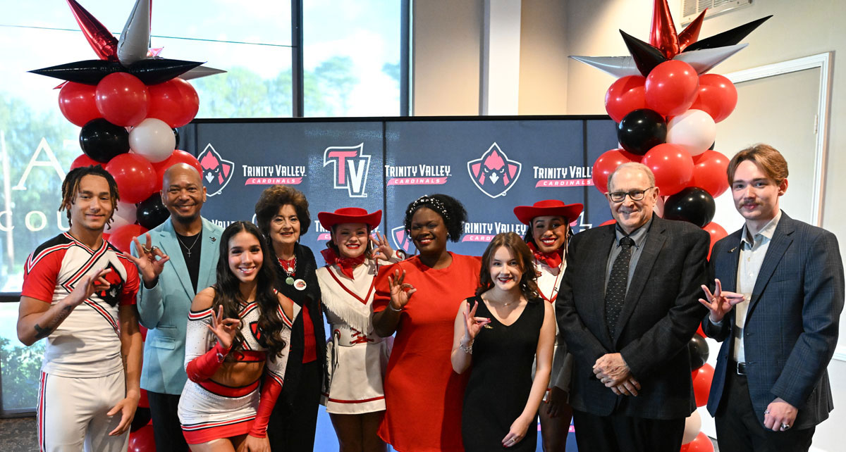 foundation and alumni members smiling in a group photo