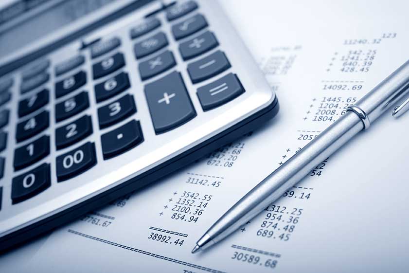 financial receipt with calculator and pen