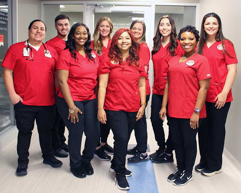 Group photo of nursing students smiling