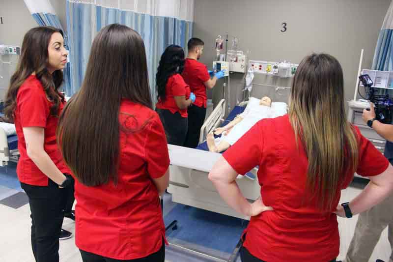 Nursing students in a simulated hospital environment