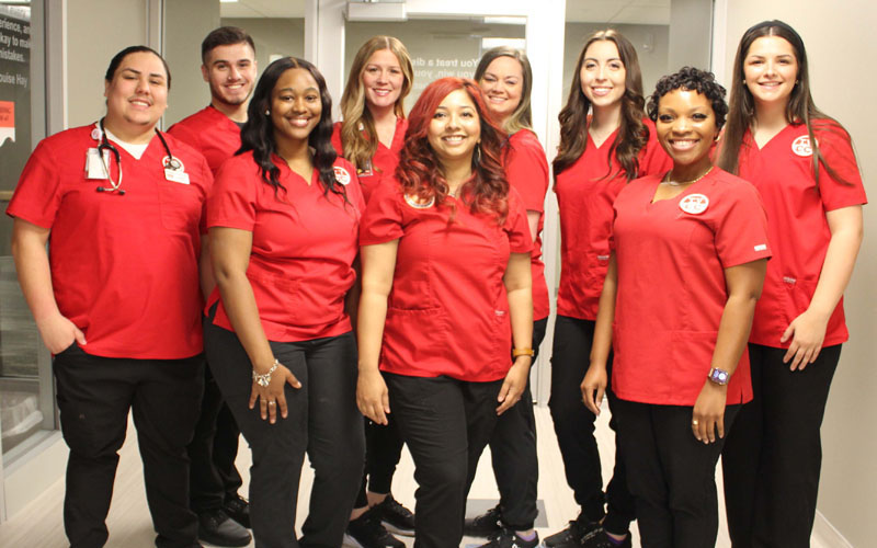 a group of health science instructors smiling