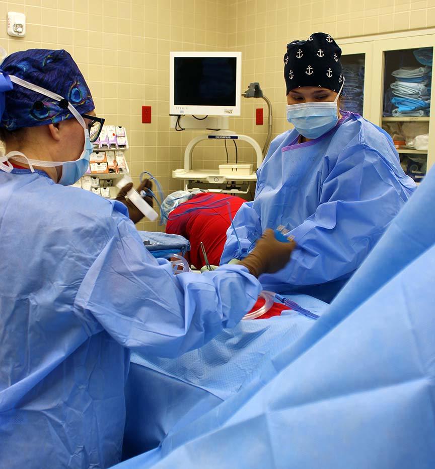 Students in an operating room simulating a medical operation